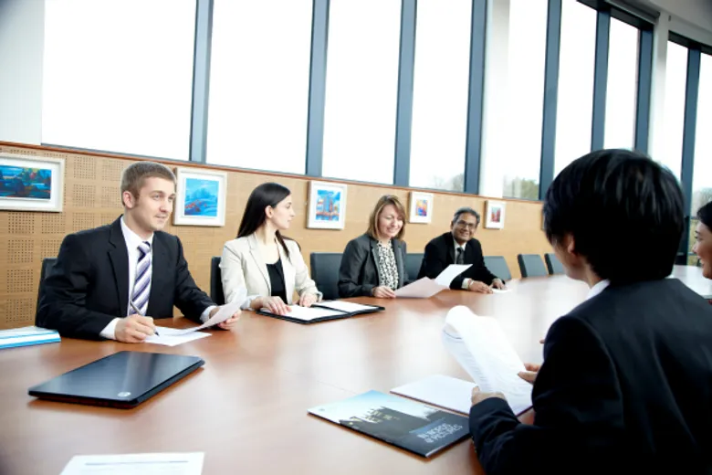 MBA 2013 Students in board room