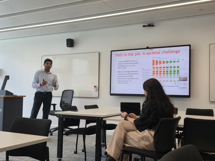 Photo of Uday Bose presenting at DBA conference