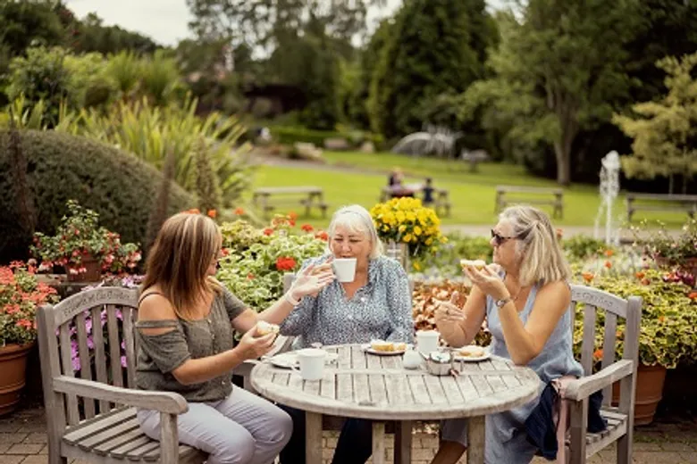 Ladies enjoying a cup of tea from the Botanic Garden cafe
