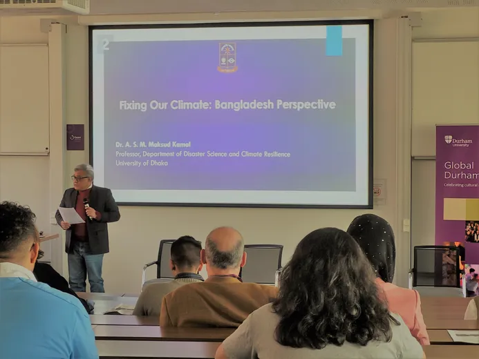 Dr Kamal from the University of Dhaka presents slides at the Fixing our Climate The Bangladesh Perspective event