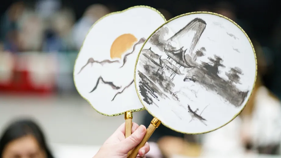 Painted fans created by students during a World Fest craft session