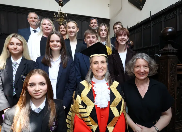 Chancellor Dr Fiona Hill and Vice-Chancellor Professor Karen O’Brien with staff and students from local schools