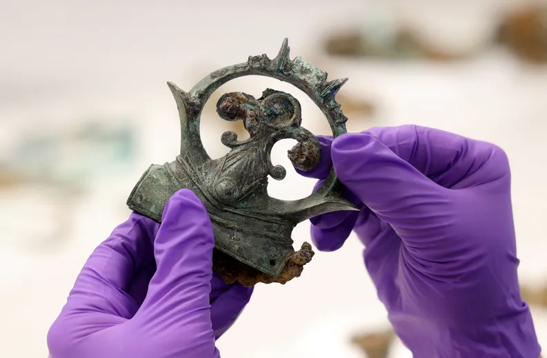 A decorative copper alloy finial from the Melsonby Hoard.