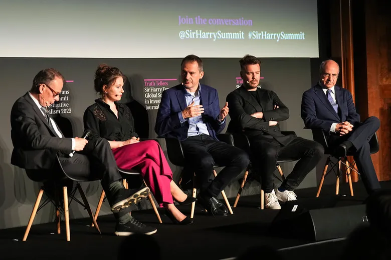 Panel of journalists onstage at the Sir Harry Evans Summit