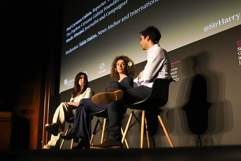 Panel of journalists onstage at the Sir Harry Evans Summit