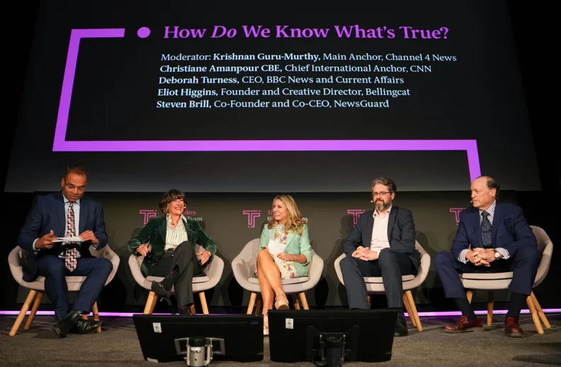 Moderator Krishnan Guru-Murthy facilitating discussion on the battle to banish disinformation