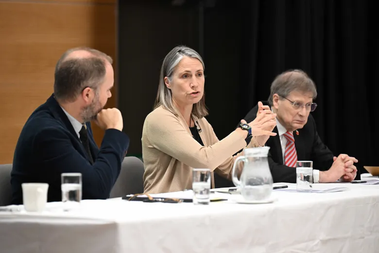 A group of people sitting at a table