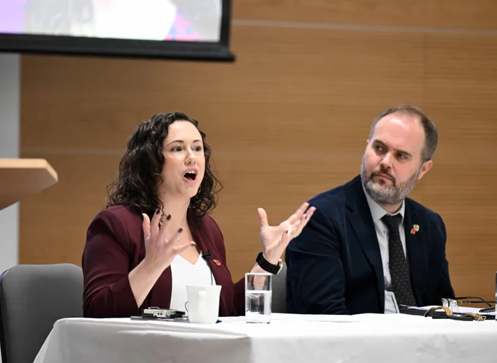 A group of people sitting at a table