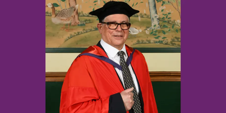 Professor George Efstathiou wearing his academic gown