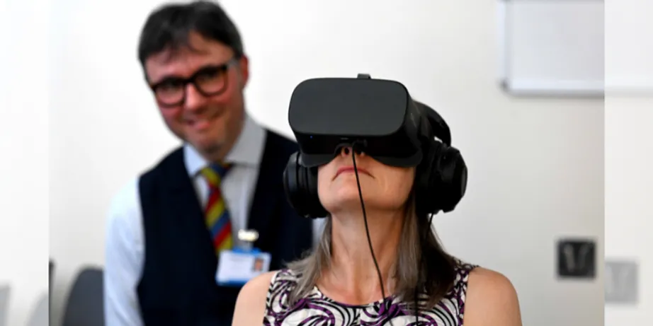 Chancellor Dr Fiona Hill wearing a virtual reality (VR) headset