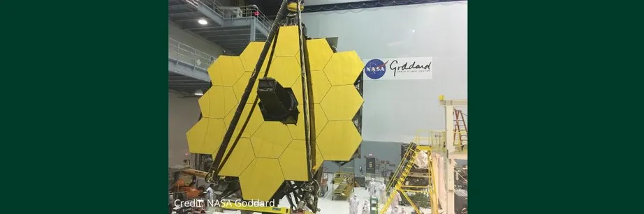 The gold, hexagonal face of the James Webb Space Telescope when it was being constructed in a workshop.