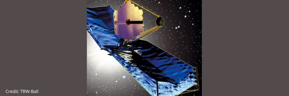 Artist's impression of the James Webb Space Telescope with black and blue solar panels and a gold dish against a background of stars