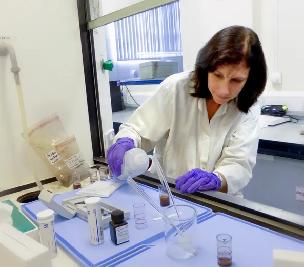 Professor Karen Milek undertaking soil analysis