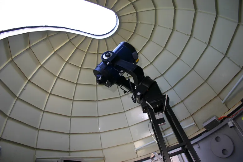 The dome begins to open above one of the department telescopes