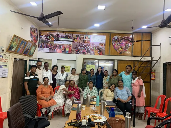 Group of community members facing the camera