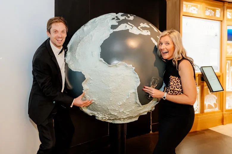 A couple of people posing for the camera