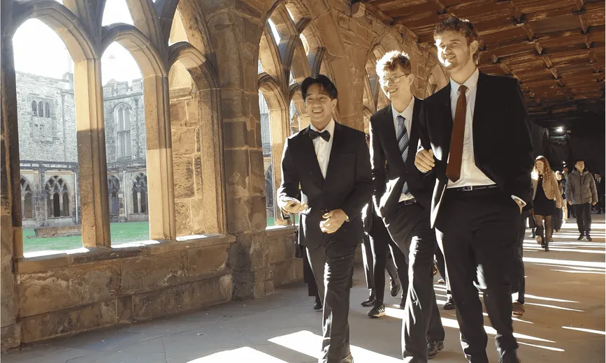 Students walking in the cloisters