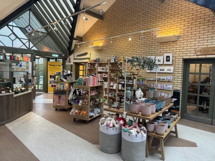 Botanic Garden Retail Merch Area showing cups and merchandise and counter