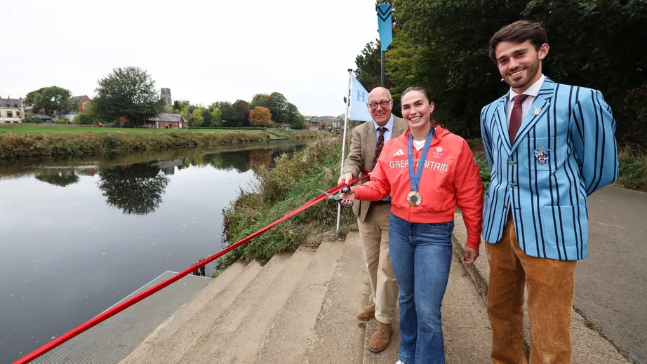 Lauren Irwin cuts the ribbon to officially open the new landing stage at the College of St Hild and St Bede’s Boat Club, Durham University