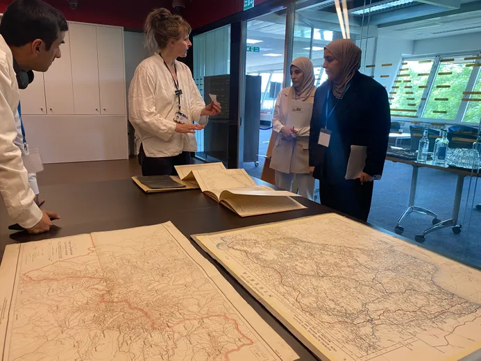 Participants looking at maps