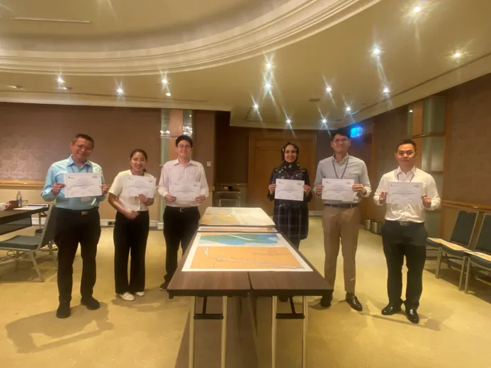 Students showing certificates