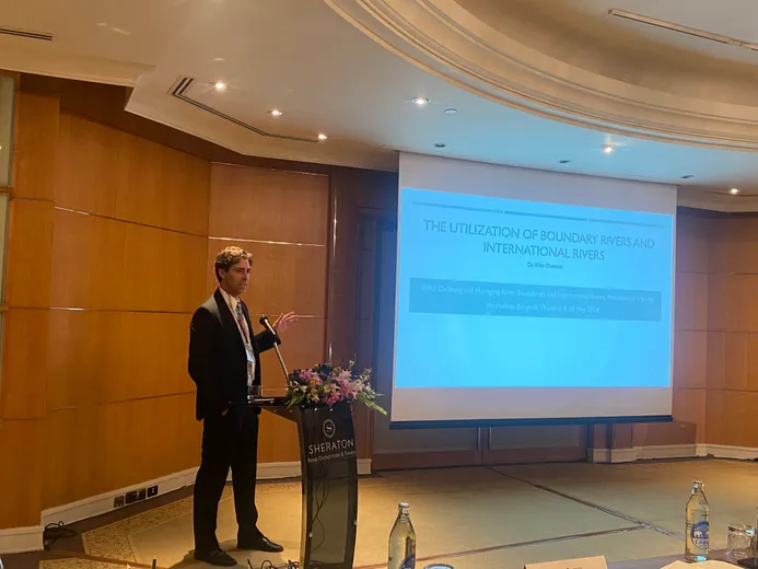 Riley Denoon speaking at IBRU workshop