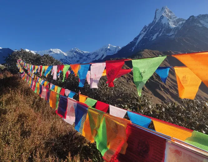 Prayer Flags with a mountain in the background