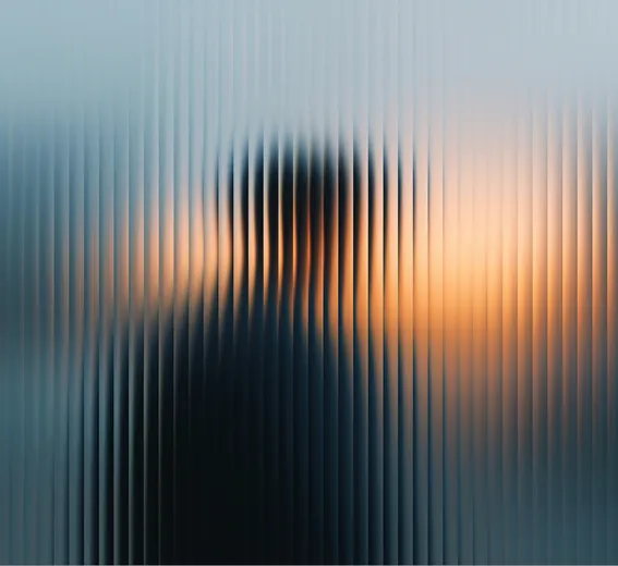 A silhouette of a person blurred behind vertical lines