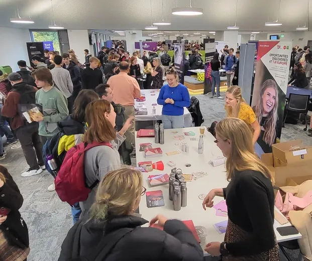 Students talking with employers at the STEM