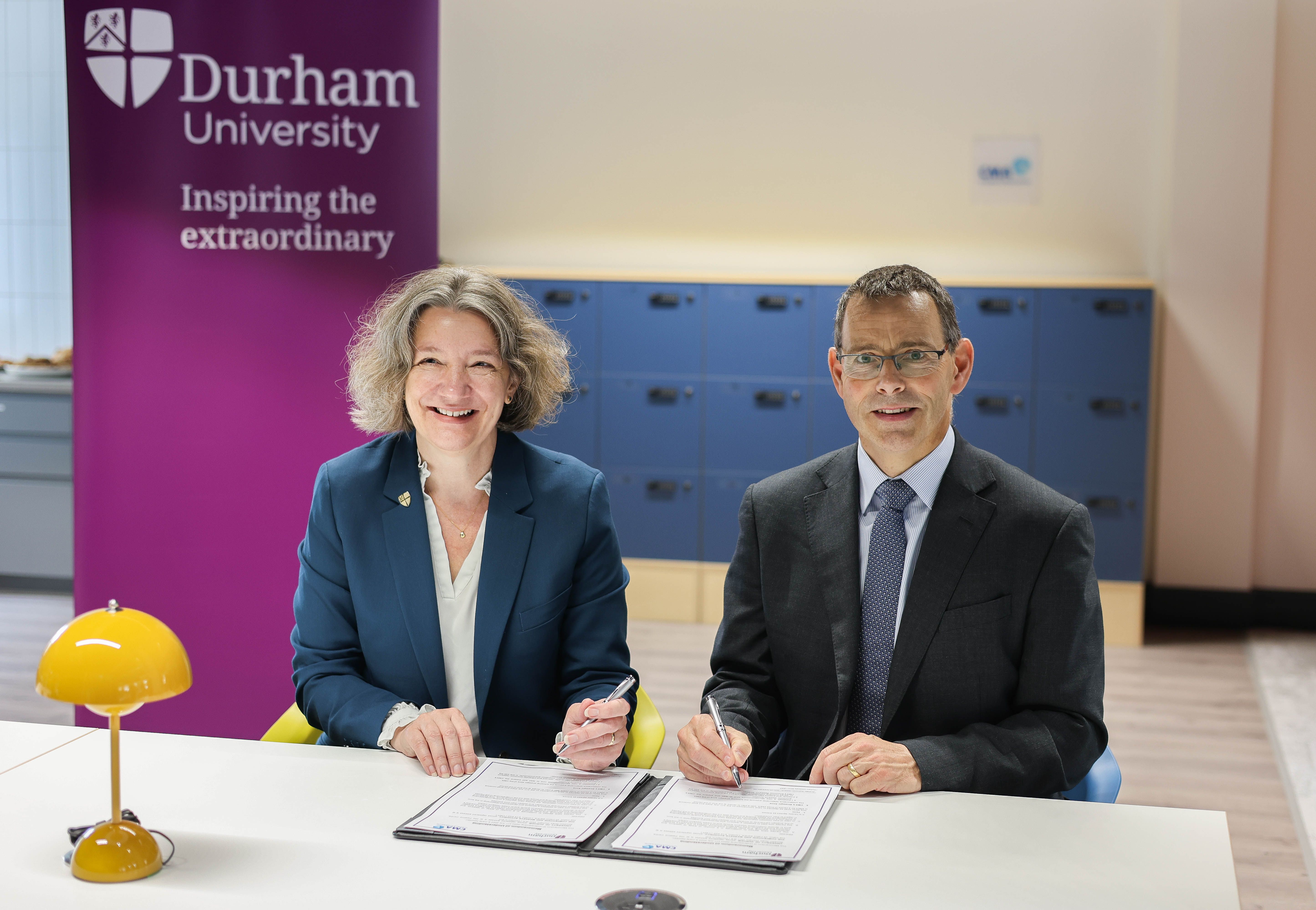 Vice Chancellor and Mike Walker signing MOU