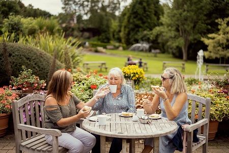 Ladies enjoying a cup of tea from the Botanic Garden cafe