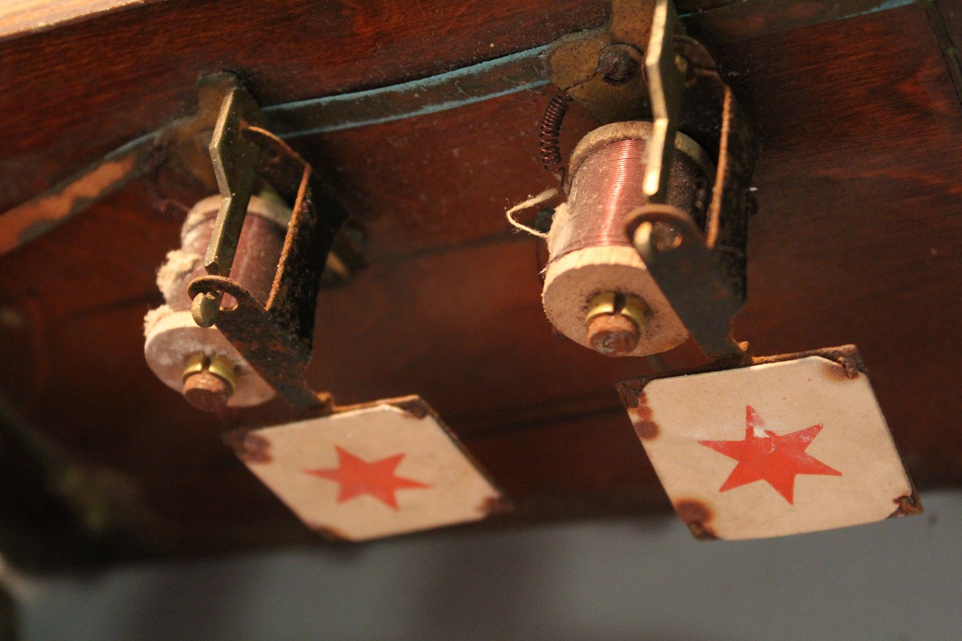 A coloured photograph of the inner workings of the bell board.