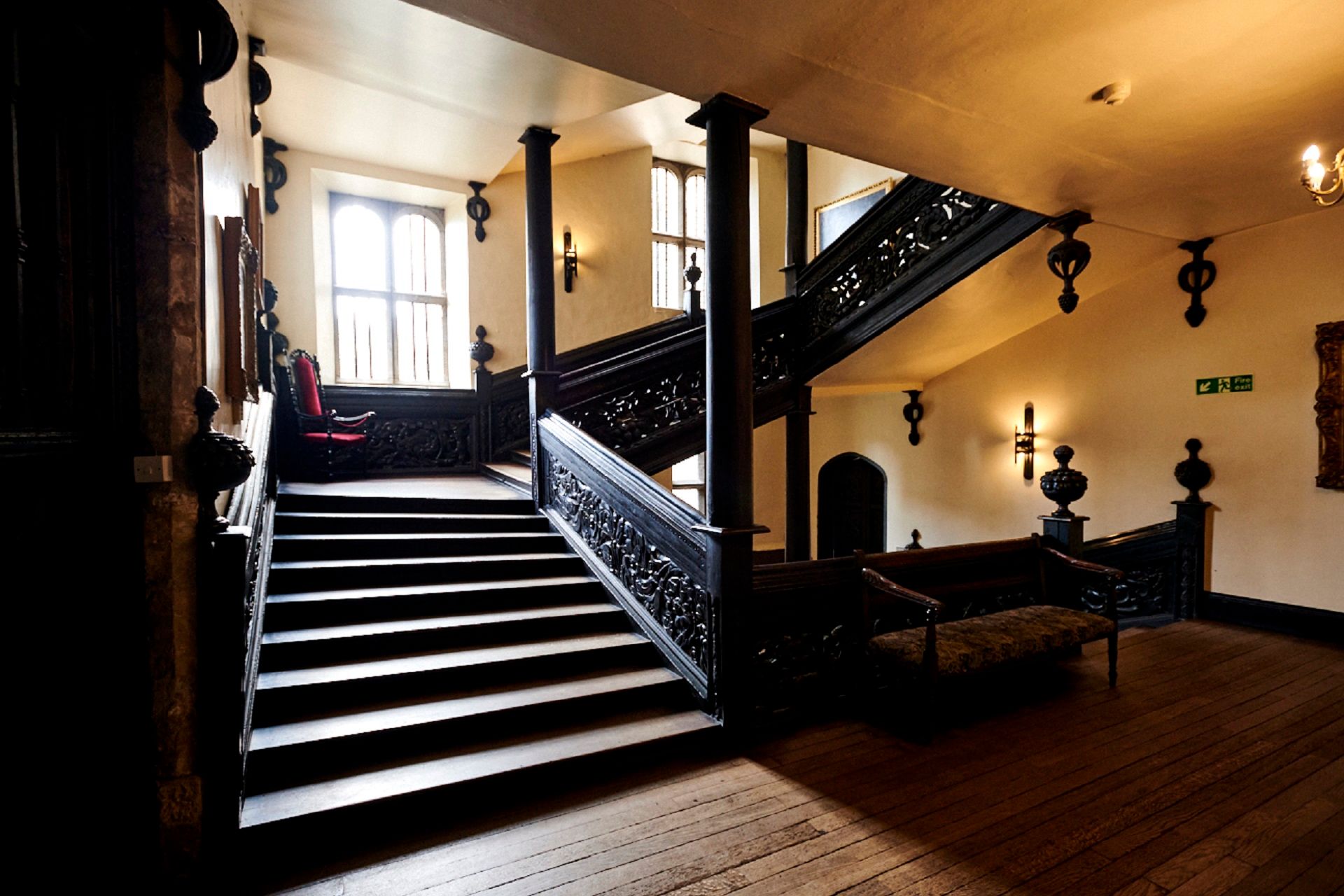 A coloured photograph looking towards the Black Stairs. Three flights of stairs can be seen, along with the pillars at the centre and the pineapples on the right.