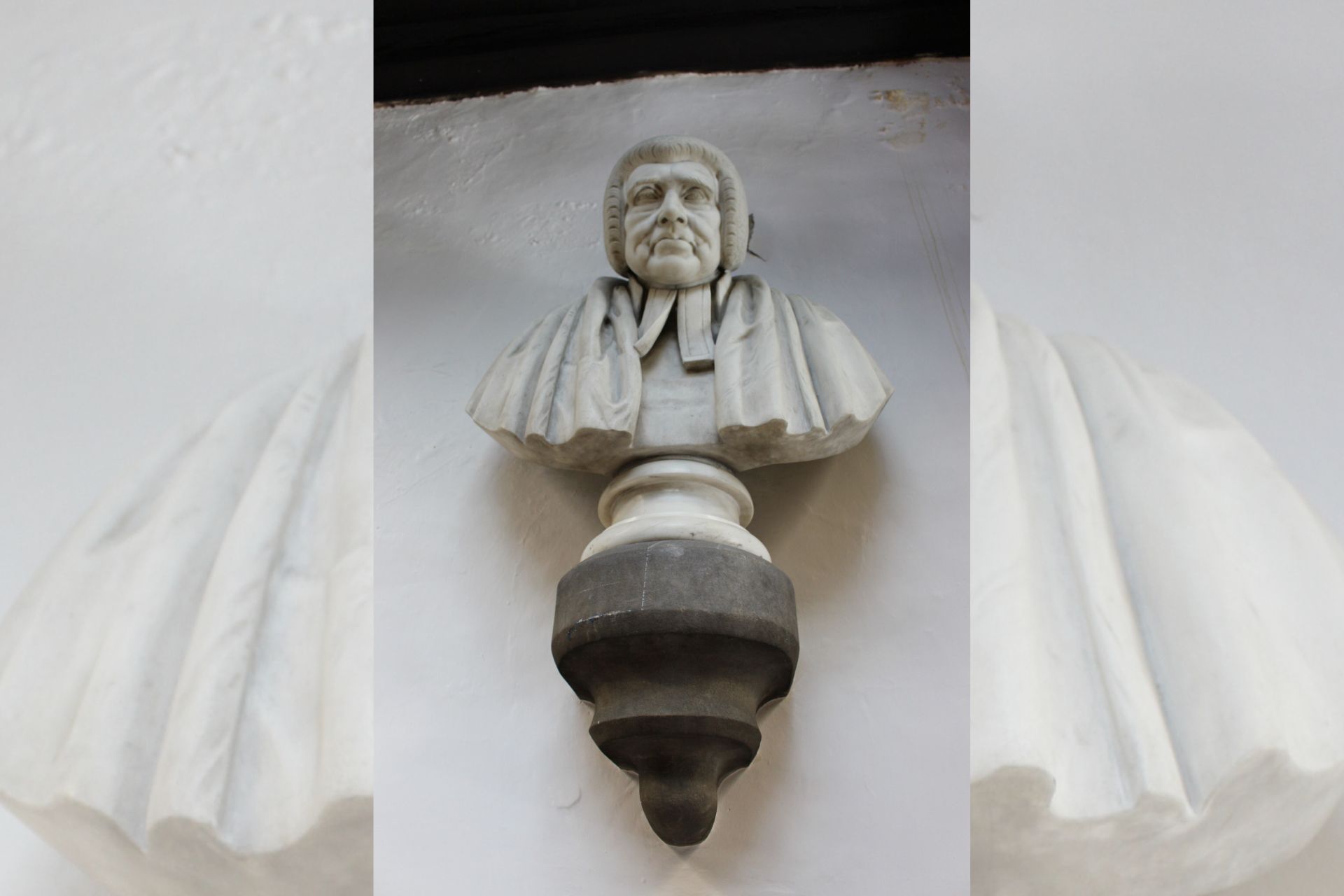 Plaster bust of Martin Routh on one of the walls in the Routh Library.