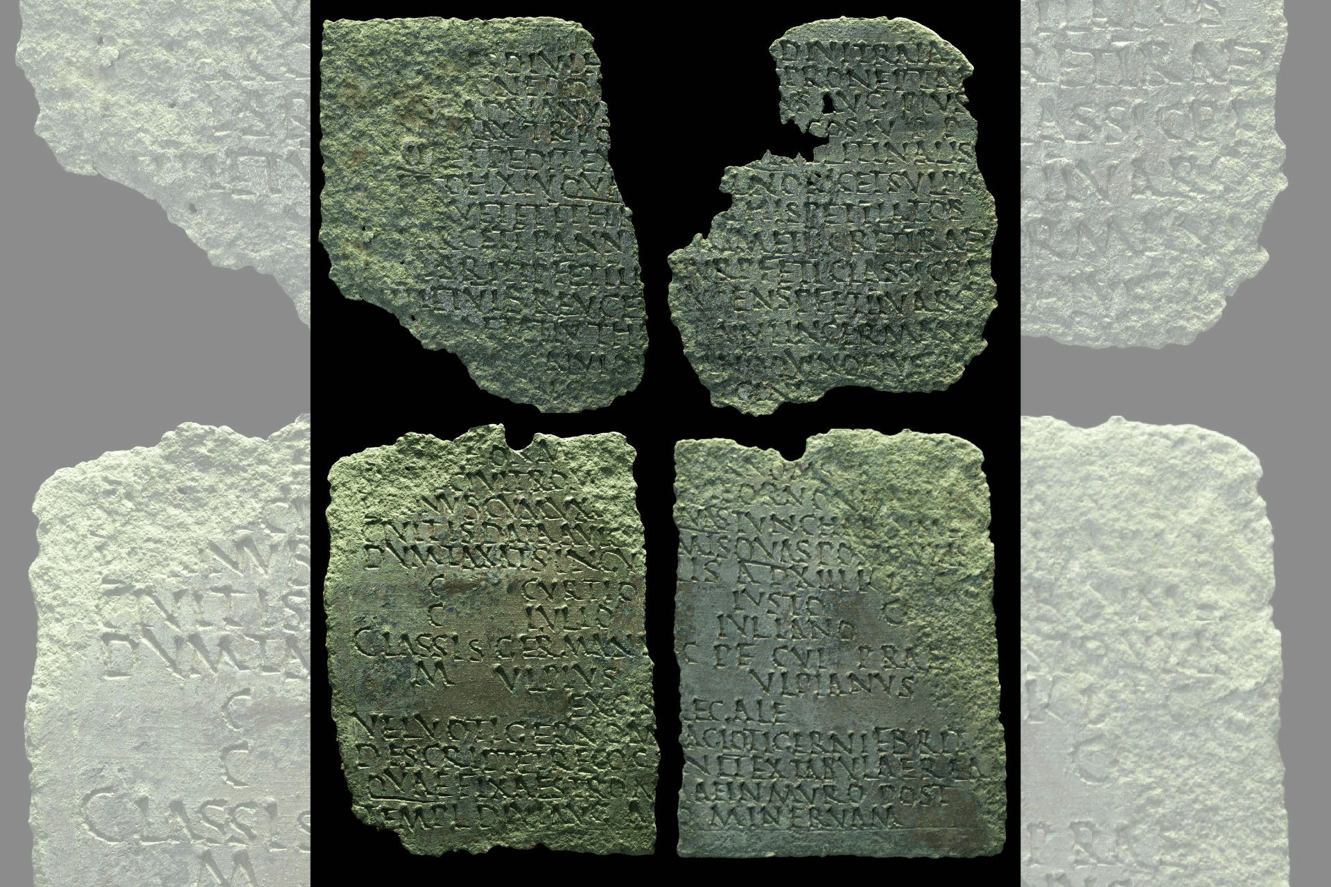 A coloured photograph of the Lanchester Diploma, which is made up of 4 pieces of copper alloy with latin inscribed onto it.