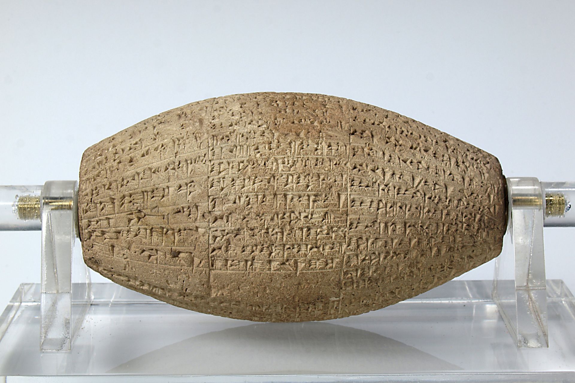 Barrel cylinder with cuneiform inscription dating to the reign of the Neo-Babylonian king Nebuchadnezzar II, 599 BCE
