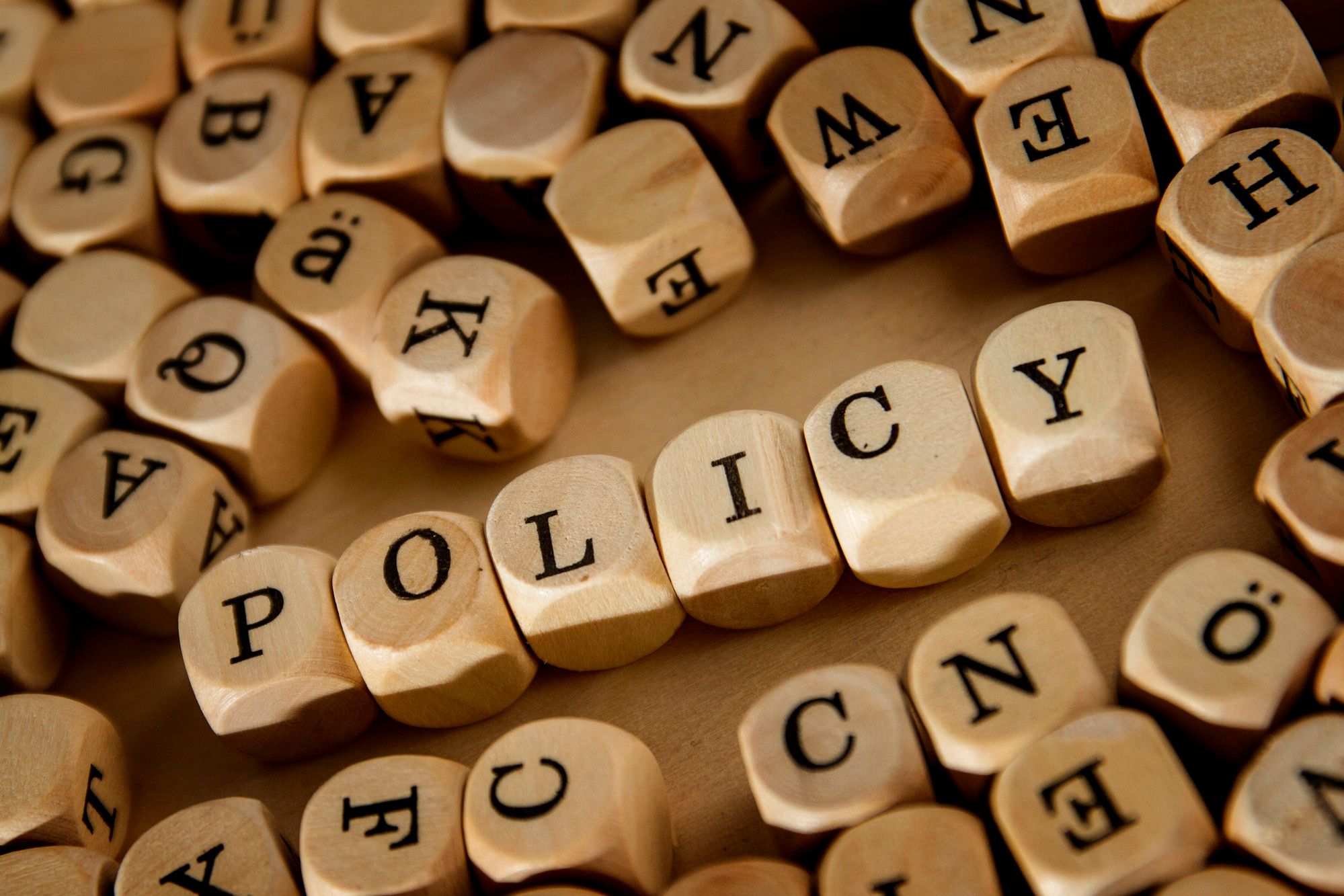 Policy written in lettered cubes