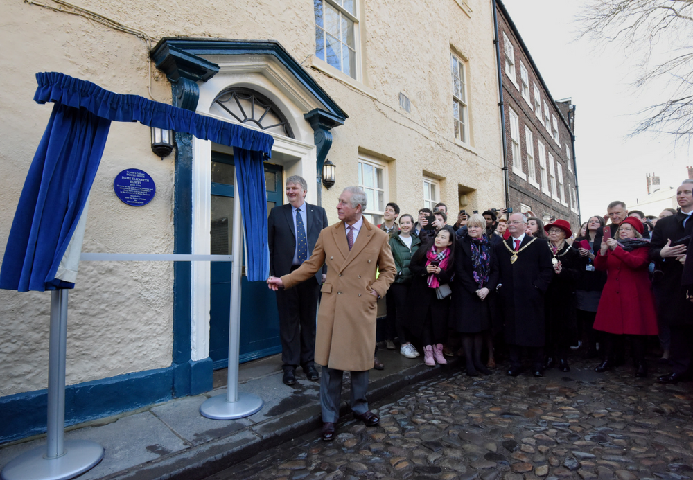 HRH Prince Charles unveils a plaque at St John's College