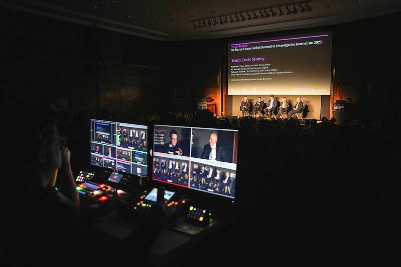 General view of the stage and screens at the Global Summit
