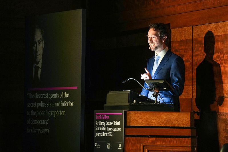 Journalist Waylon Cunningham onstage at the Sir Harry Evans Global Summit