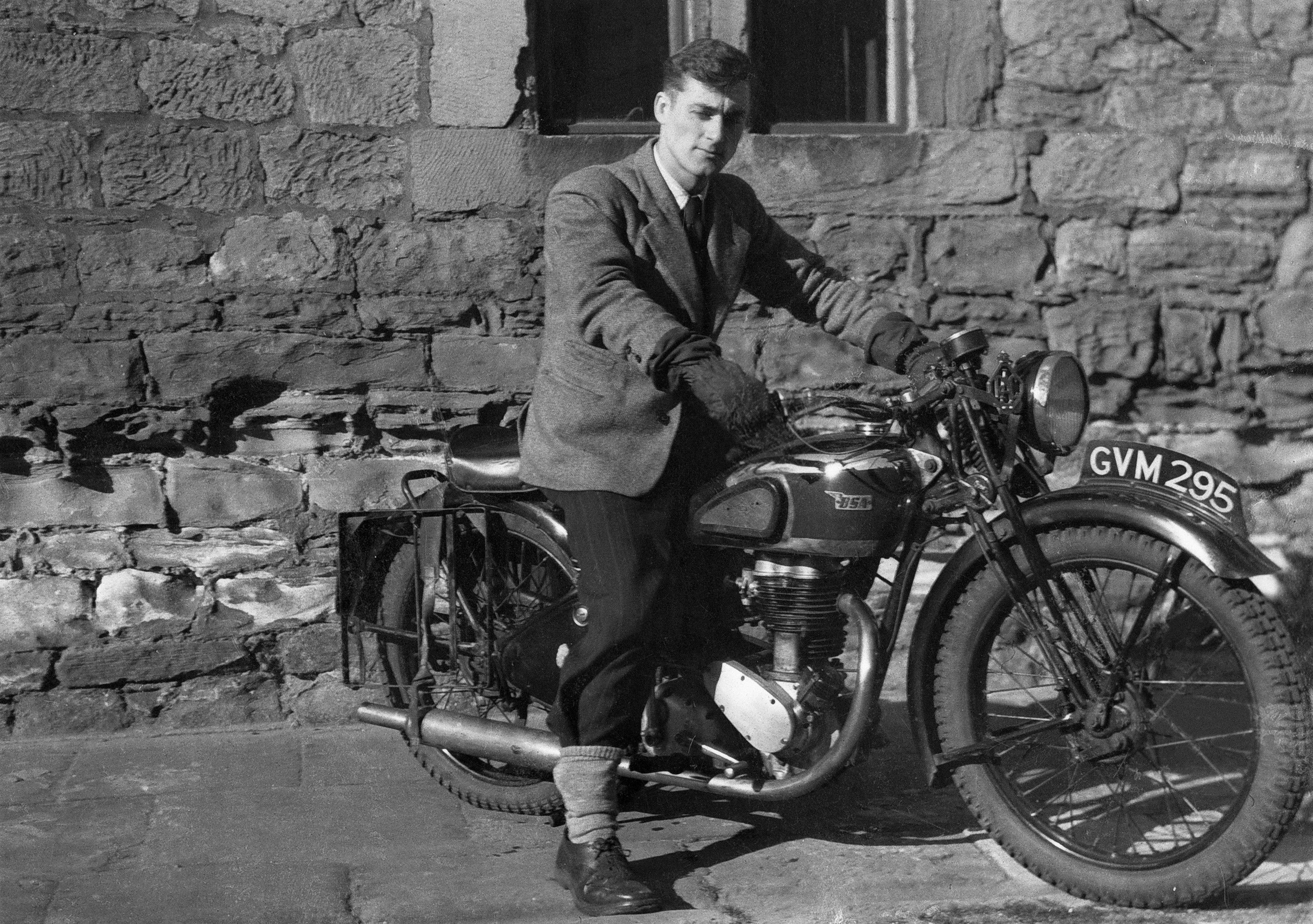 Sir Harry Evans on a motorbike
