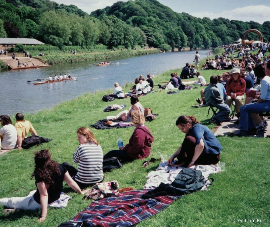Crowds enjoy the sun next to the River Wear