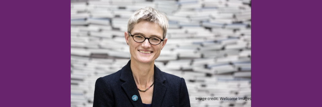 Professor Jane Macnaughton looking directly to camera with a light coloured background