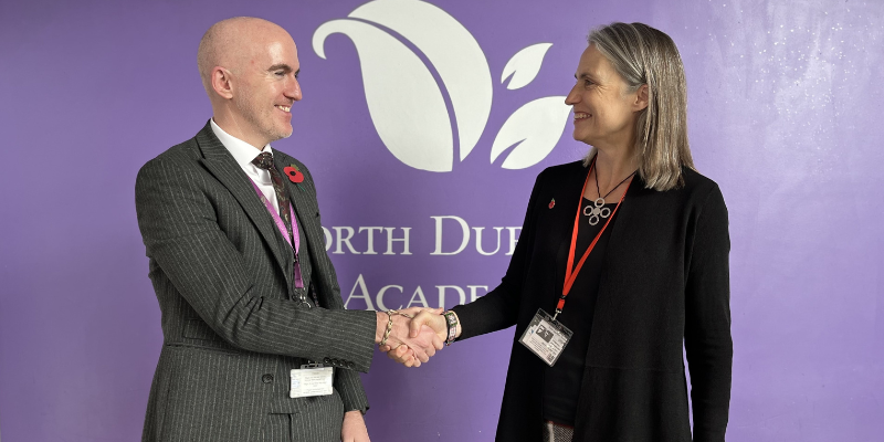 North Durham Academy Headteacher Mark Gray shaking hands with Chancellor Dr Fiona Hill