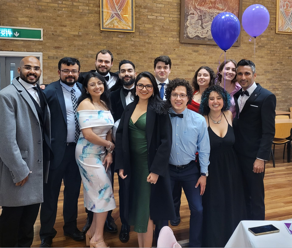 Photo of students posing for a photograph at awards dinner