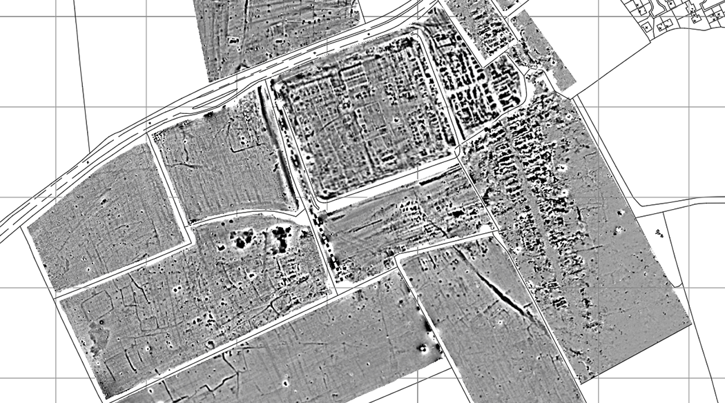 a greyscale map of magnetometer data from the site of a Roman Fort showing buried archaeological features