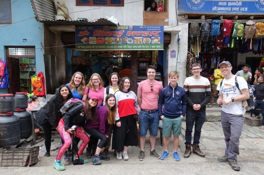 Students outside a roadside cafe in Bahrabise, Nepal, March 2019