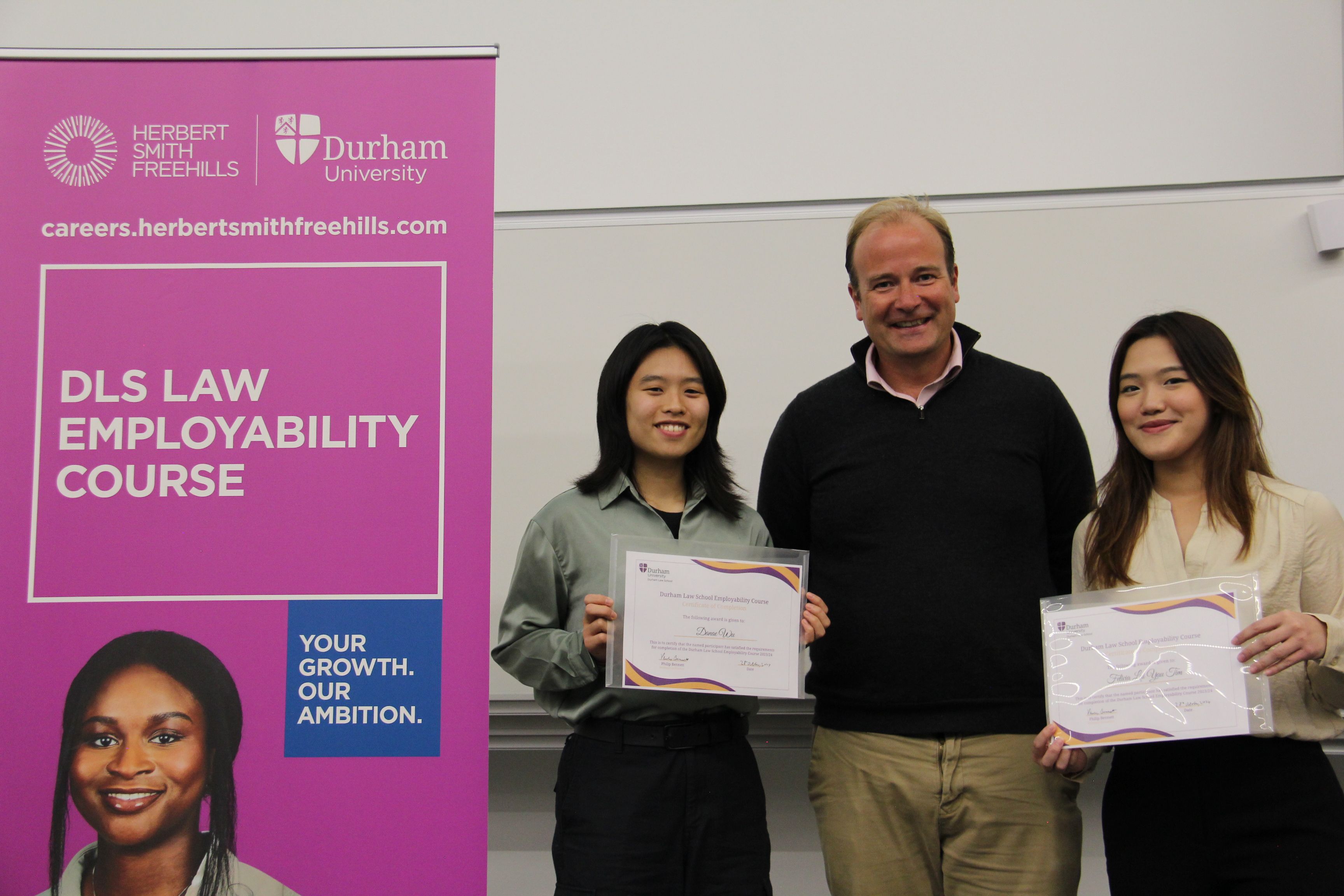 Danae Wu and Felicia Lai-Yau-Tim, 2023/24 Employability Course finishers and Michael Aherne, Partner, Herbert Smith Freehills