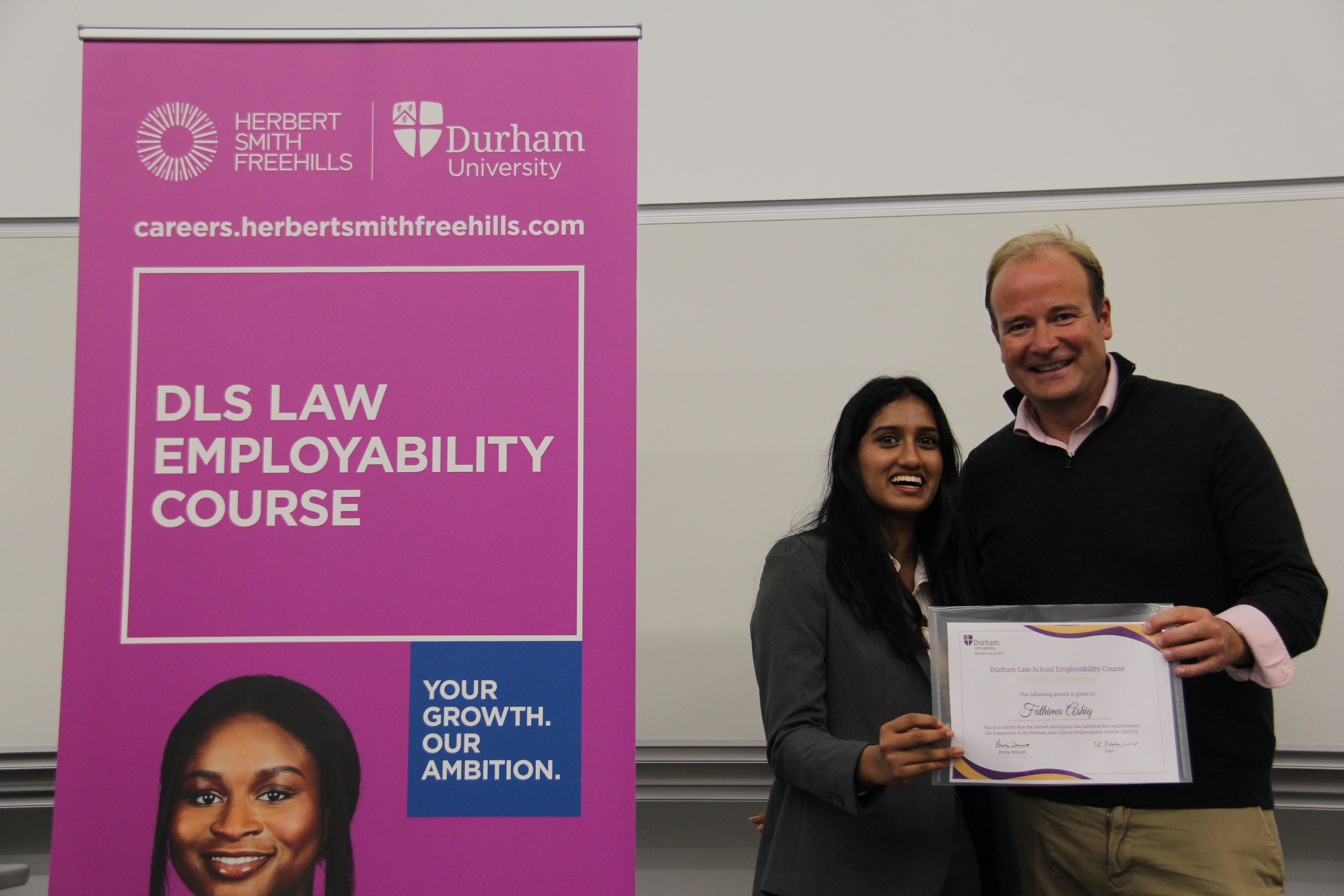 Fathima Ashiq, 2023/24 Employability Course finisher, and Michael Aherne, Partner, Herbert Smith Freehills