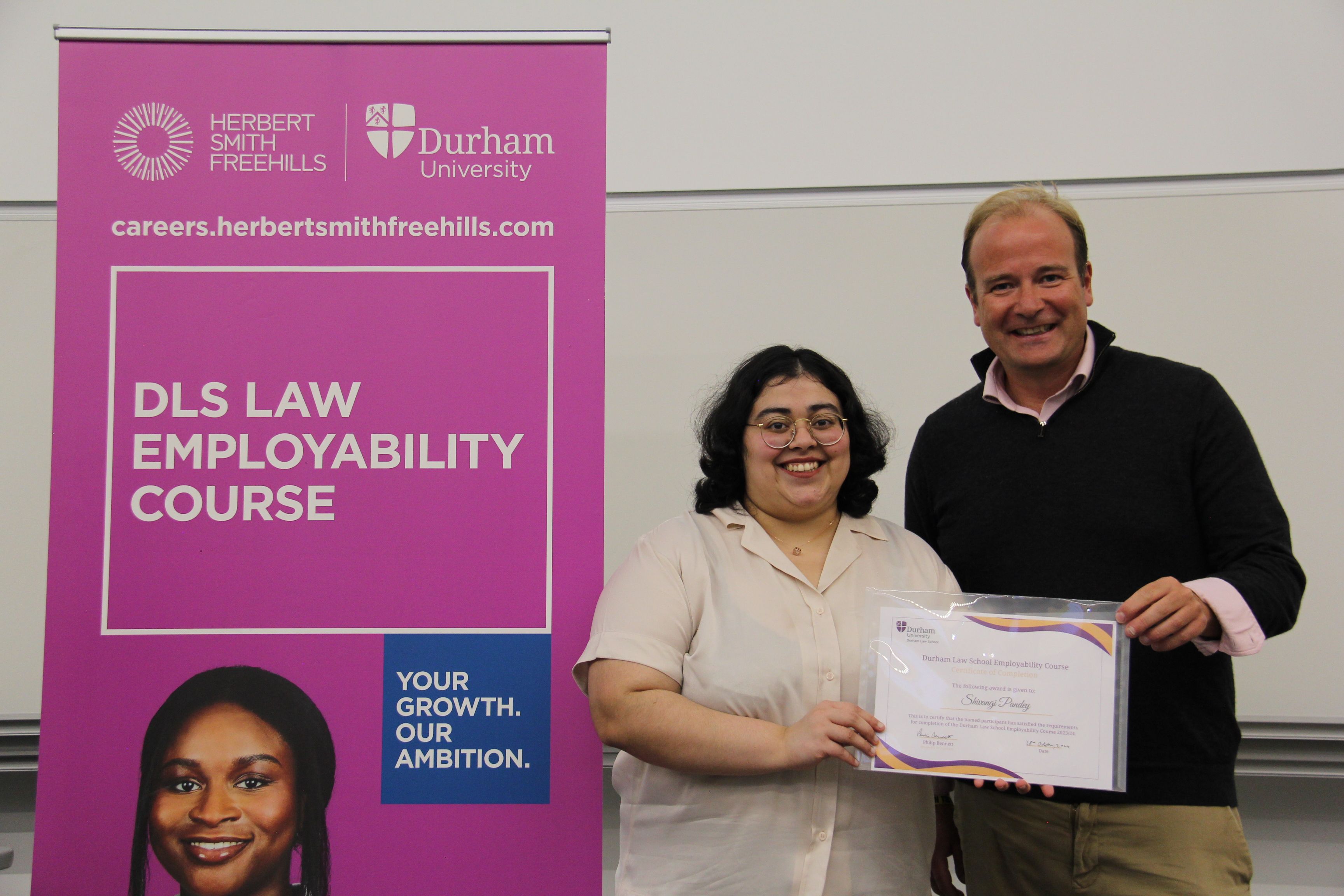 Shivangi Pandey, 2023/24 Employability Course finisher and Michael Aherne, Partner, Herbert Smith Freehills